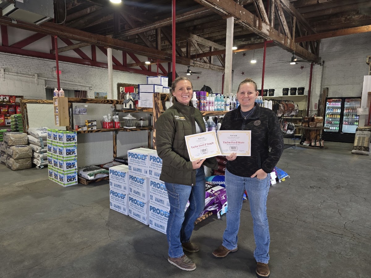Alisha Fowler and Amanda Feely, owners of Taylor Feed & Supply, on the shop floor