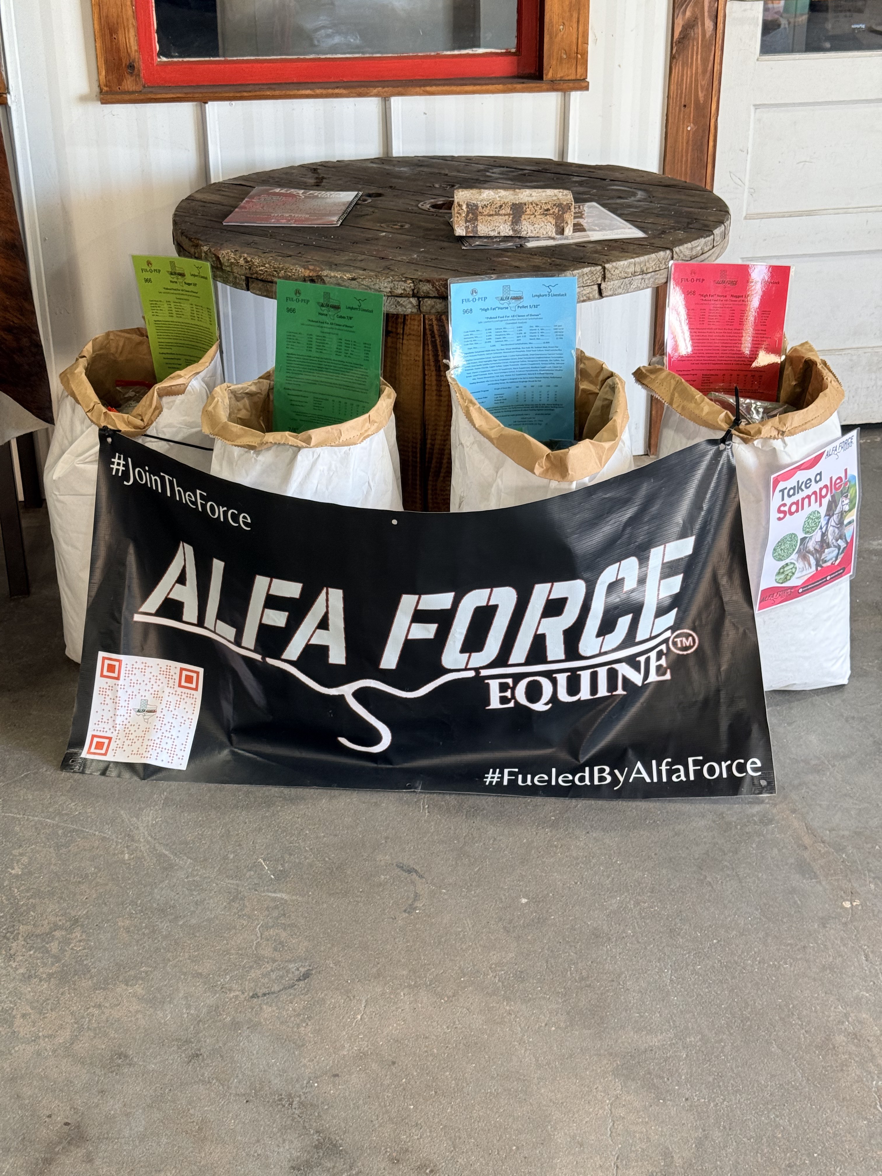 Alfa Force Equine bags and banner on the shop floor
