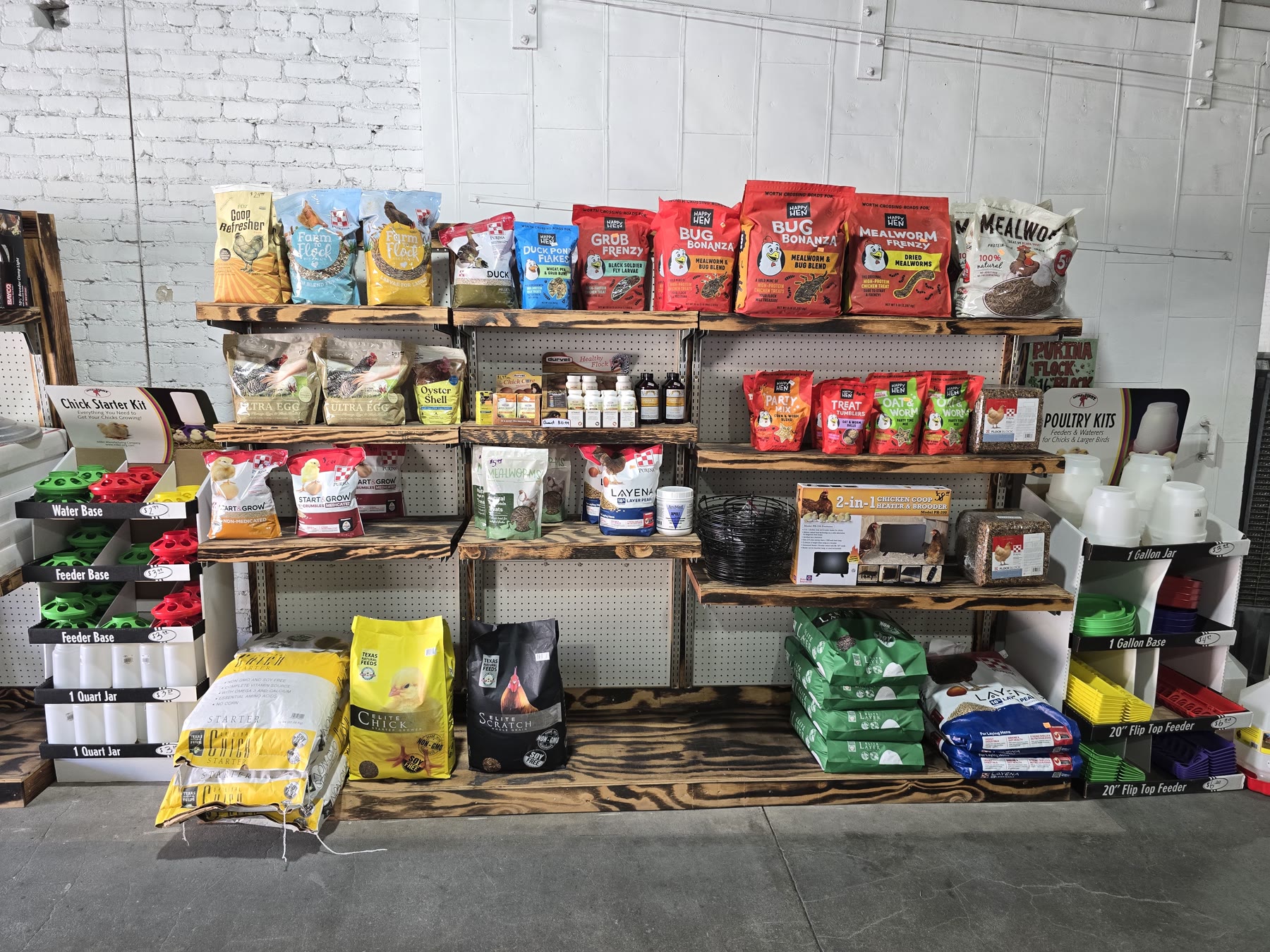 Poultry feed wall with layer and chick bags