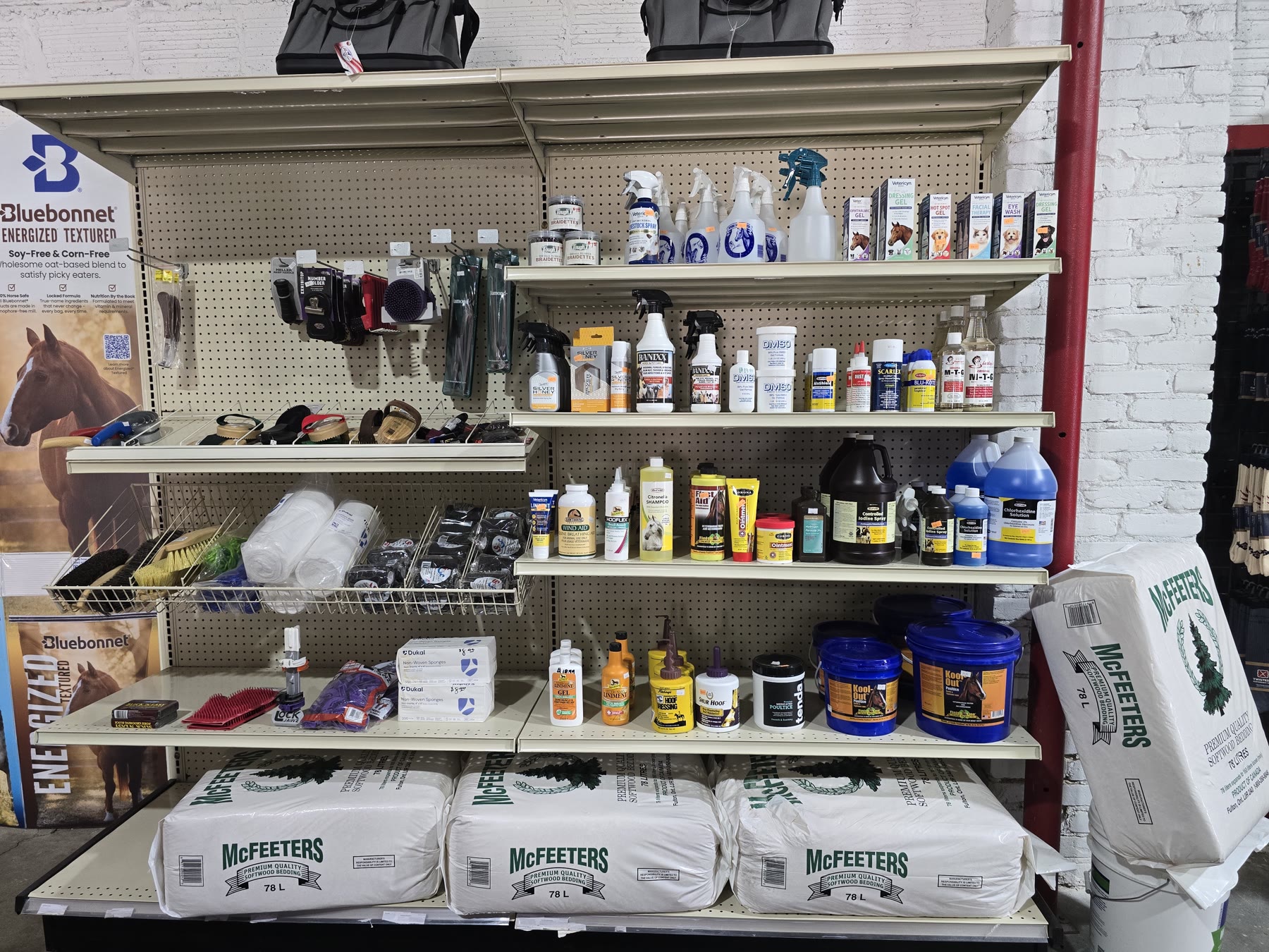 Horse care and barn supplies on the grooming wall