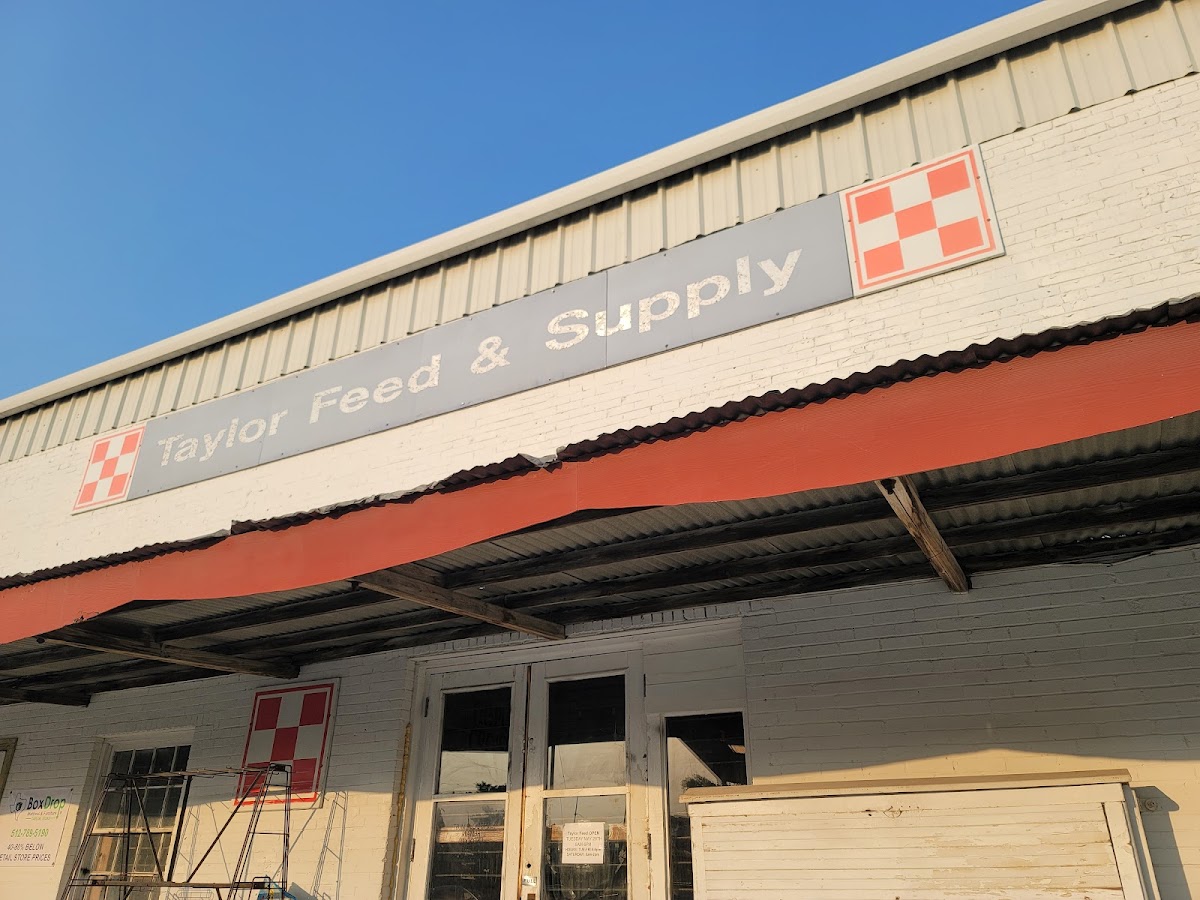 Taylor Feed & Supply storefront at 102 Talbot Street, Downtown Taylor, Texas
